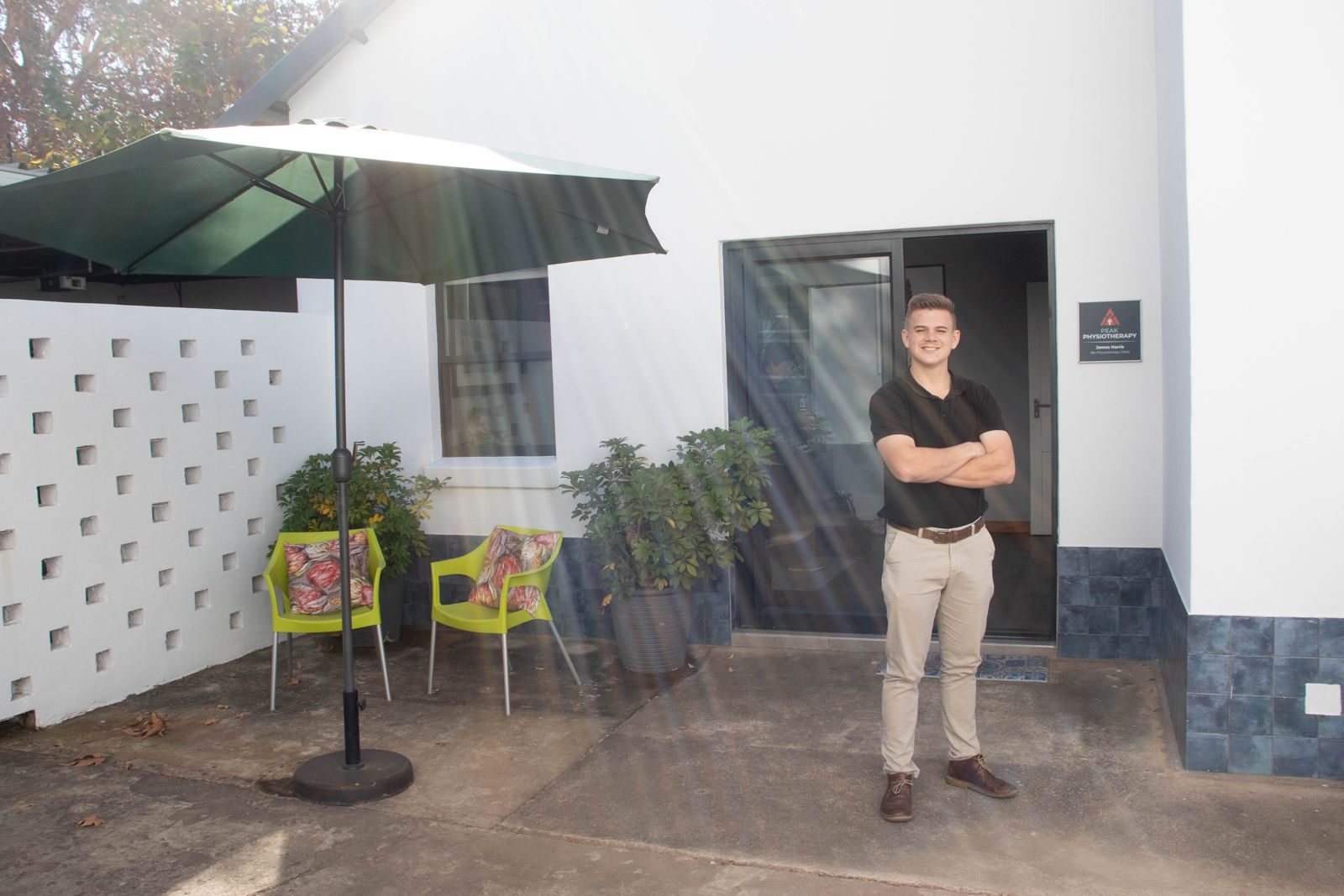 Peak Physiotherapy practice entrance in Mayville, Pretoria, James Harris at the door